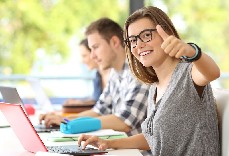 thumbs-up-student-at-computer-800px.jpg